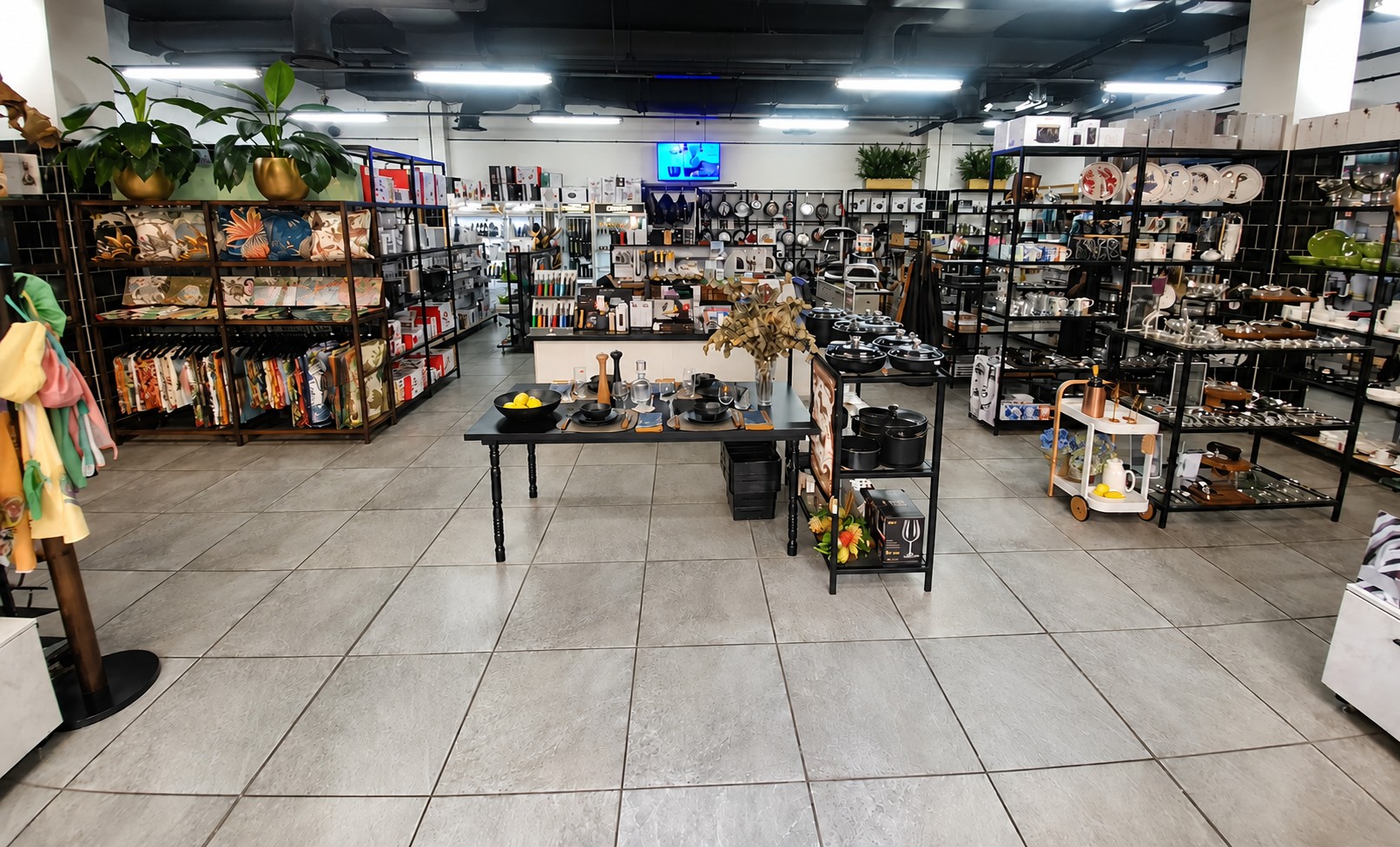 Inside Cookin Ballito — shelves of cookware, tableware and kitchen tools