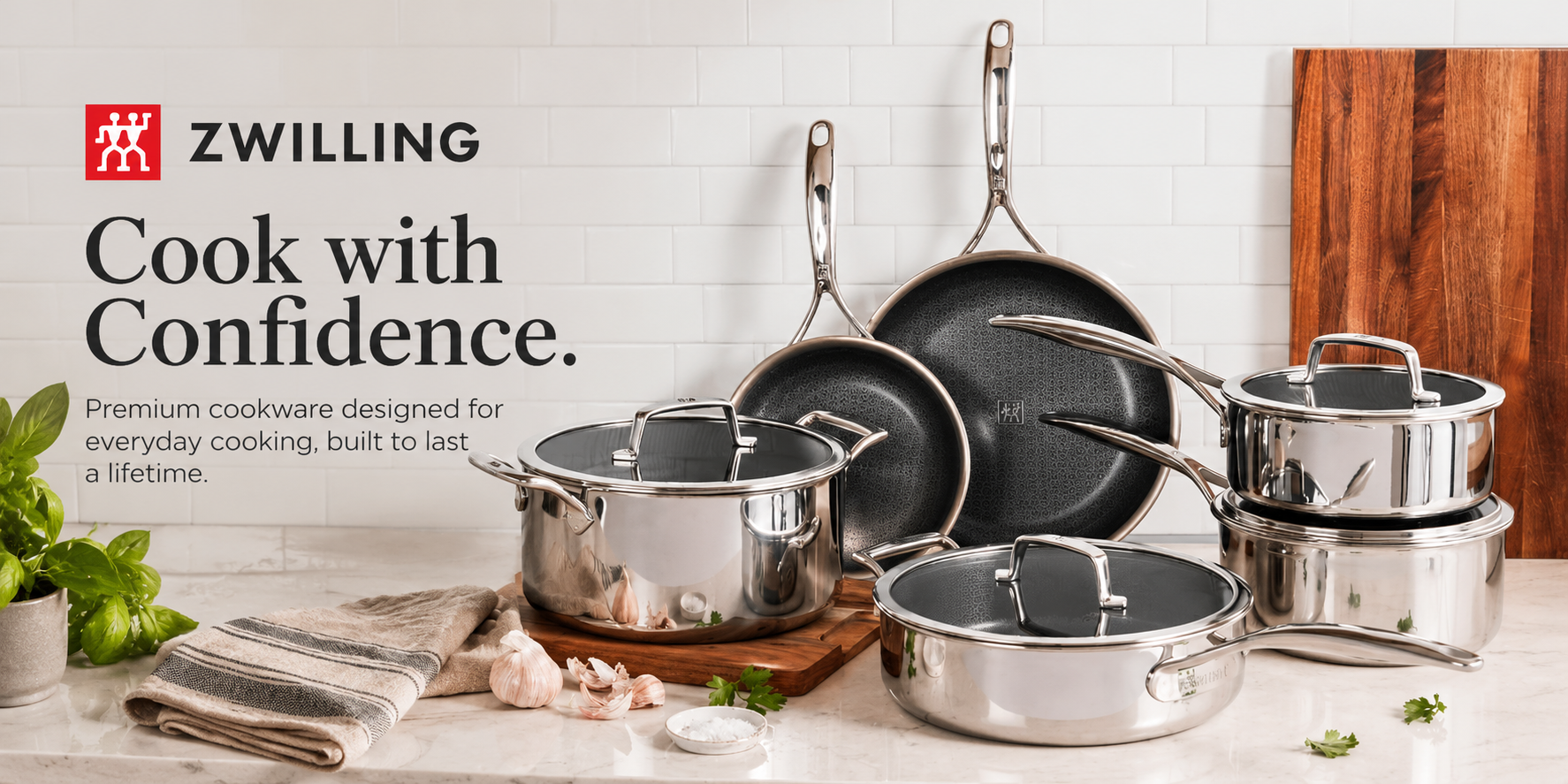 Zwilling stainless steel cookware on a marble kitchen counter — Cook with Confidence