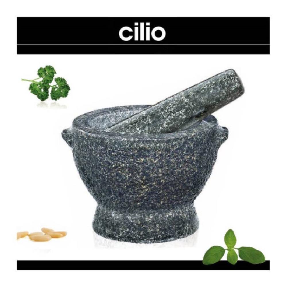 Mortar and pestle with herbs on a white background, featuring the brand 'cilio'.