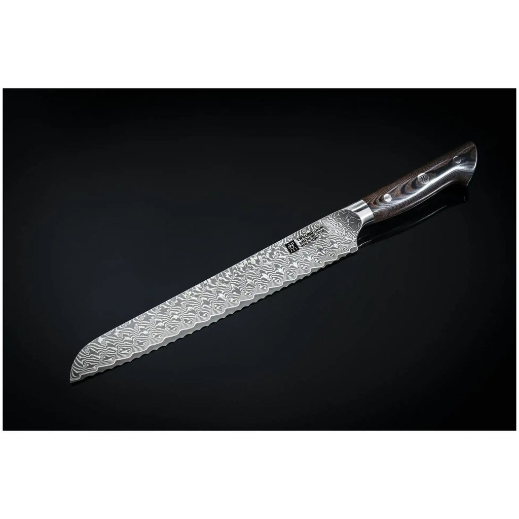 Zwilling Takumi Damascus bread knife 23cm with sleek damascus steel wavy blade and dark textured handle