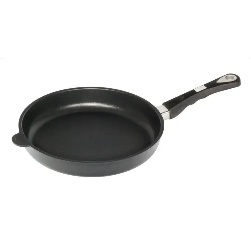 Black frying pan with a handle on a white background