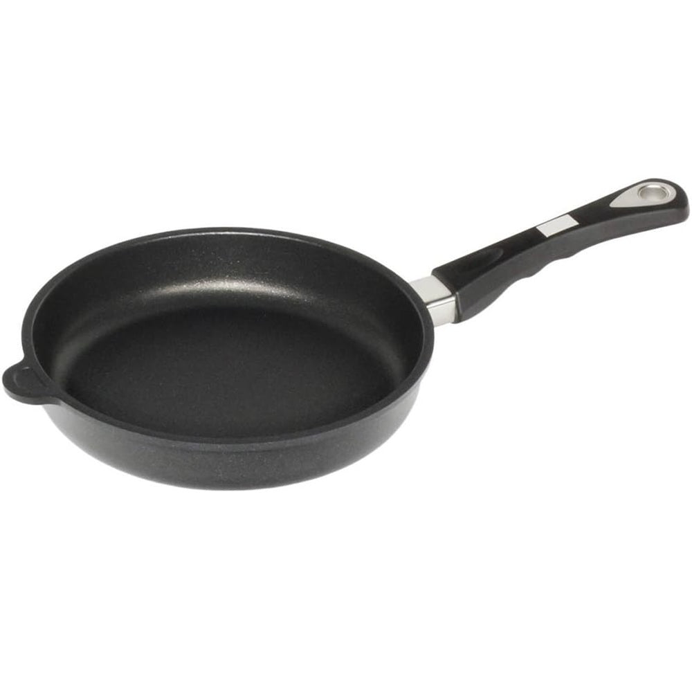 Black frying pan with a handle on a white background