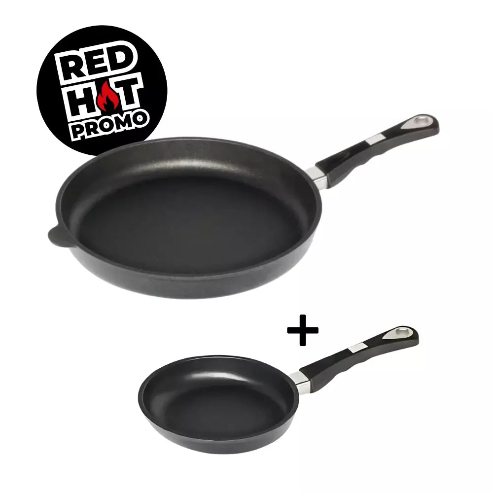 A 32cm non-stick frying pan, and a 20cm  non-stick frying pan with a promotion sign saying "red hot promo"