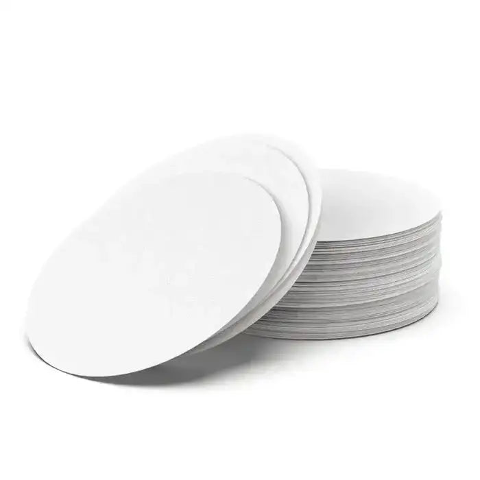 Stack of white paper plates on a white background