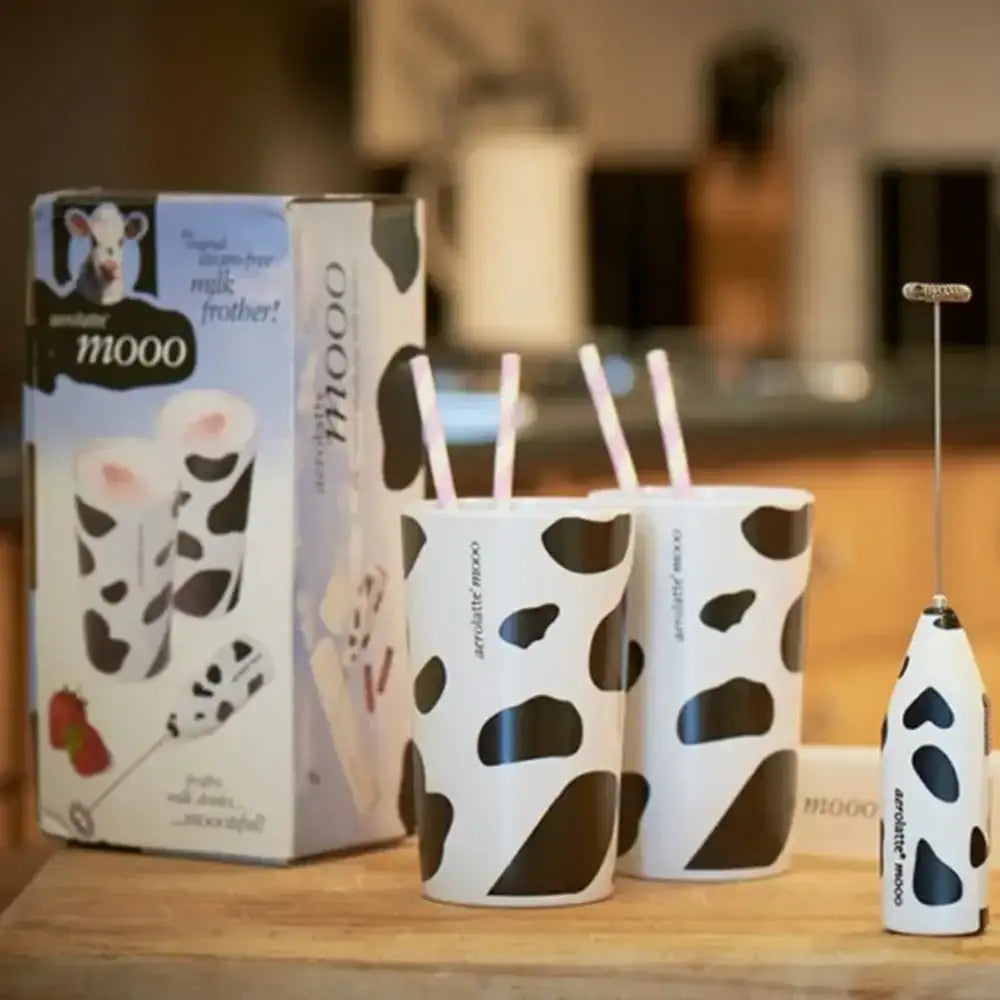 Aerolatte Moo handheld milk frother with cow print cups and box, kitchenware at Cookin Stores