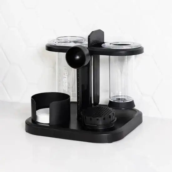 Aeropress compact organizer stand for kitchen countertop, black, on white tile background
