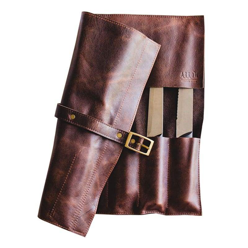 Brown leather knife roll with gold buckle on a white background
