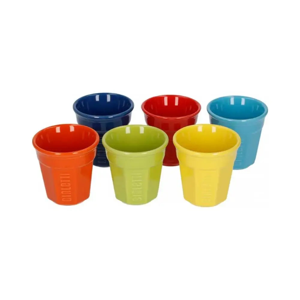 Set of colorful ceramic cups on a white background