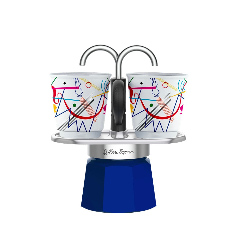 Two colorful coffee cups with a metal stand on a white background