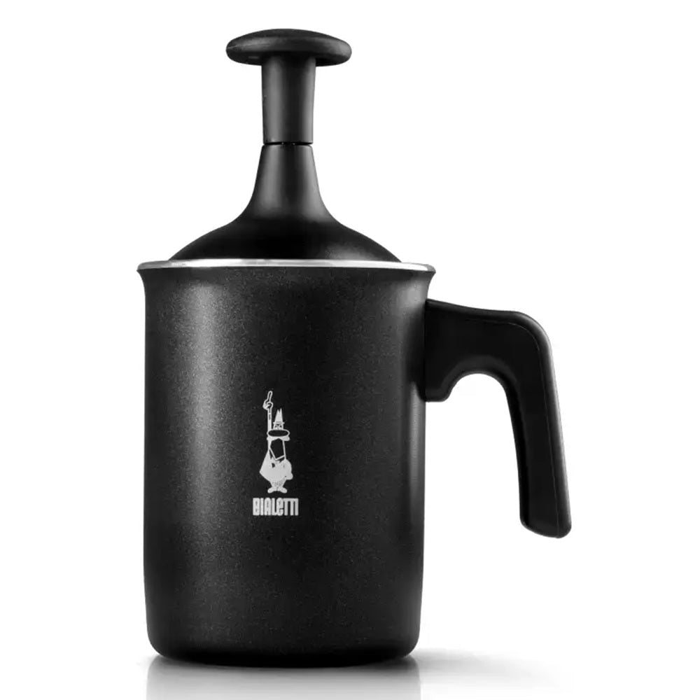 Black milk frother with a handle on a white background