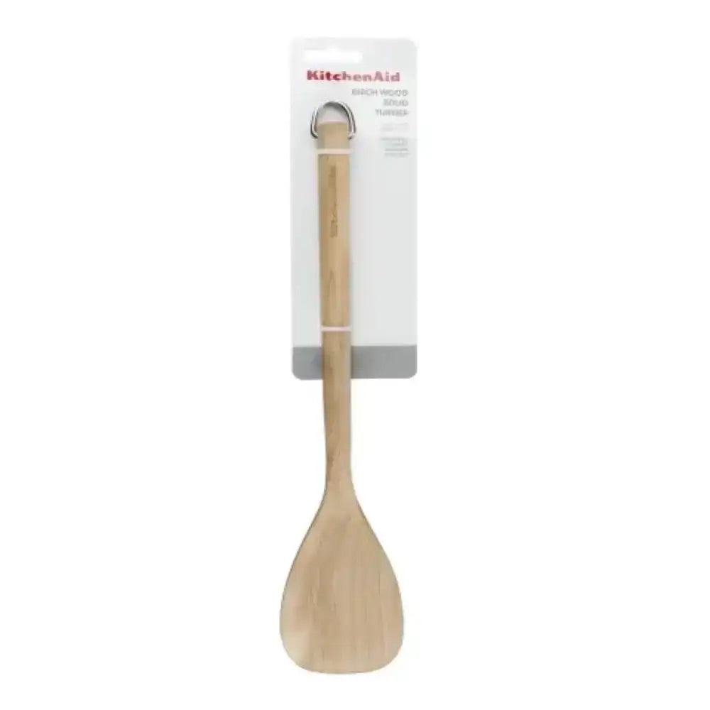Wooden turner with KitchenAid packaging on a white background