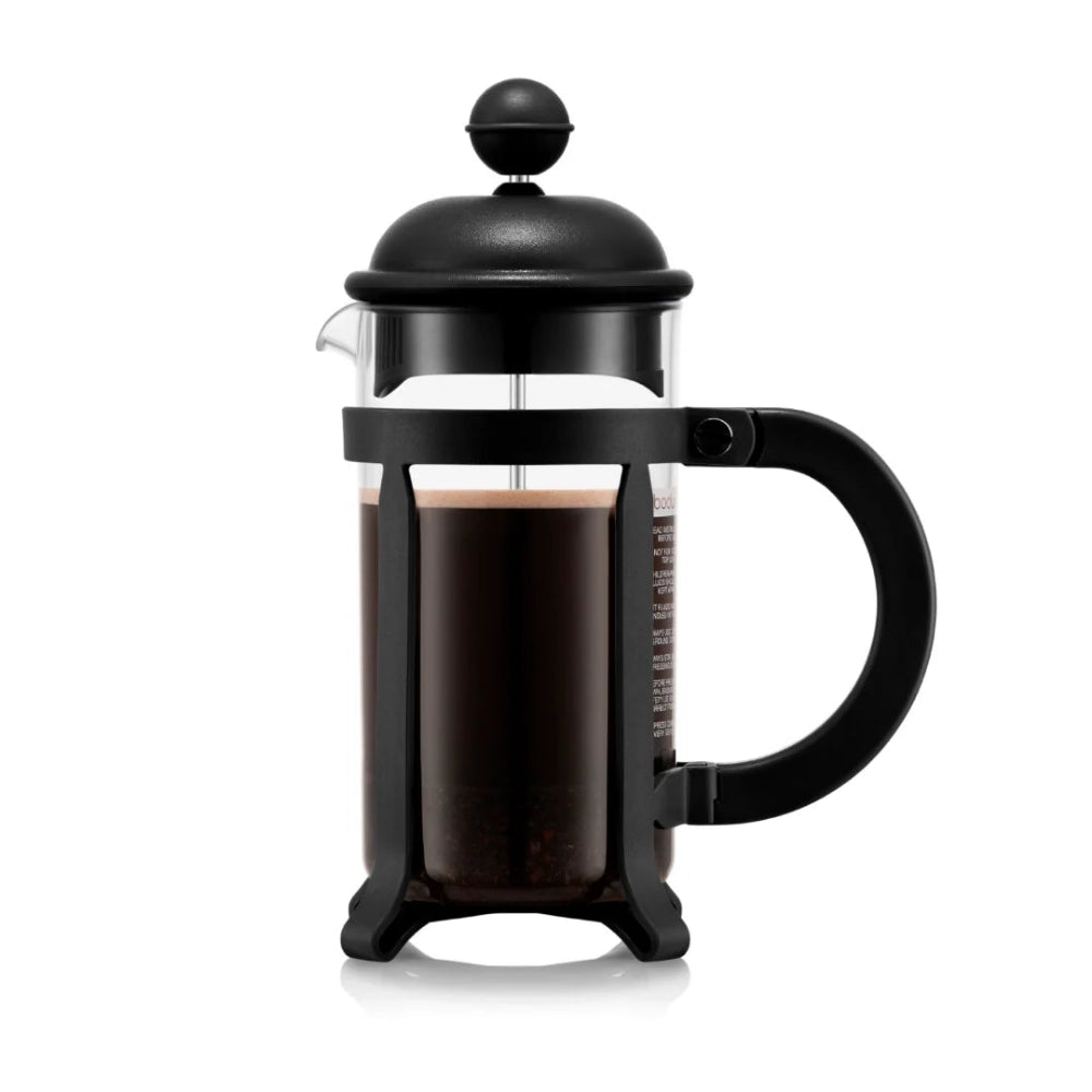 A classic bodum French press coffee maker with a black metal frame, lid, and handle, featuring a clear glass carafe filled with dark coffee. The product is shown on a clean white background with a subtle reflection underneath.