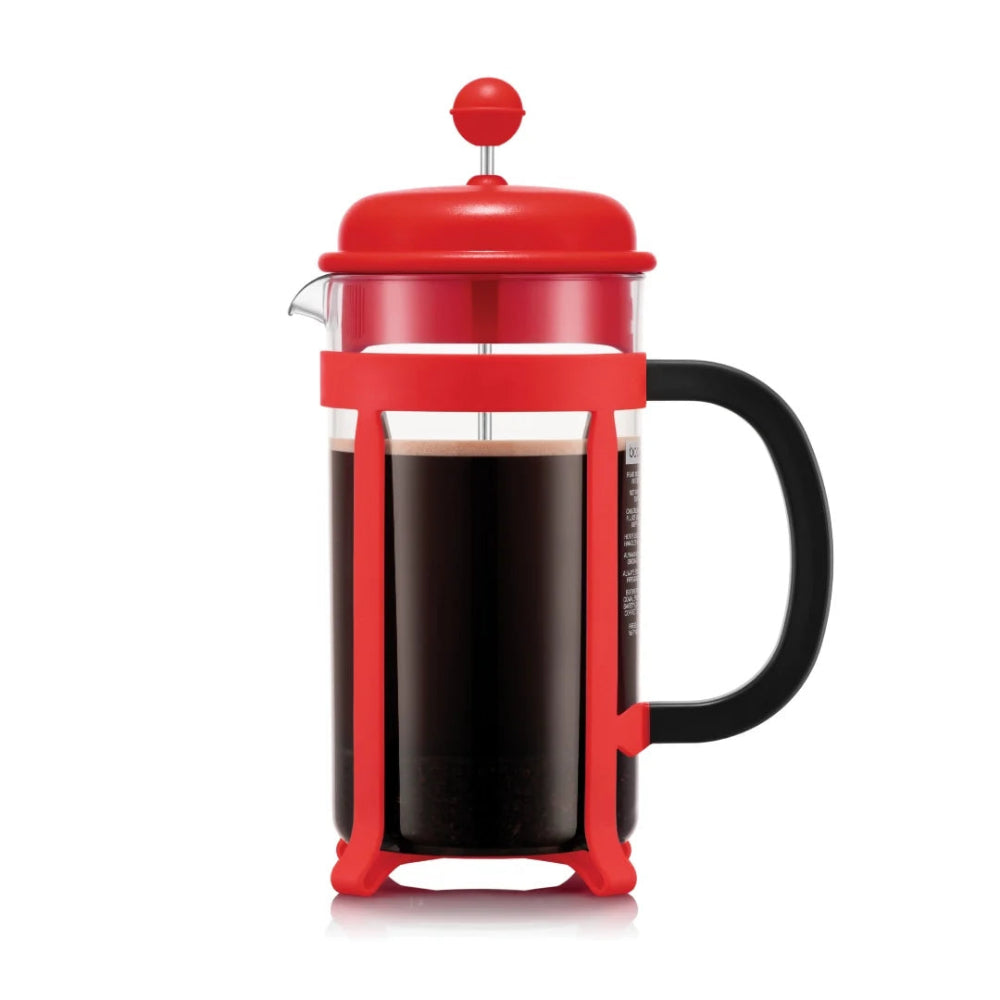 Red french press on a white background.