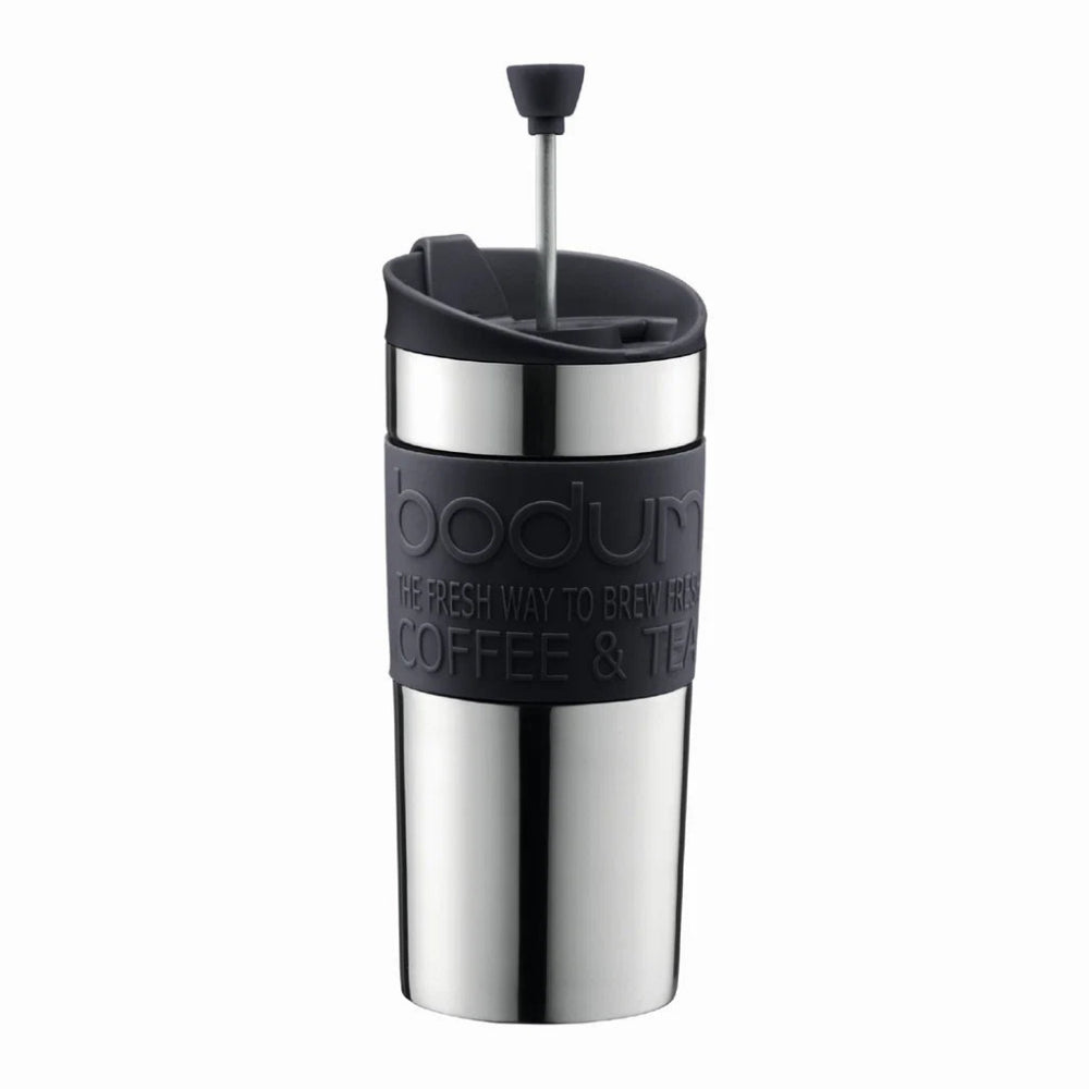 A stainless steel French press travel mug with a black silicone sleeve featuring the embossed brand name 'bodum' and a black lid with a metal plunger, shown on a plain white background.