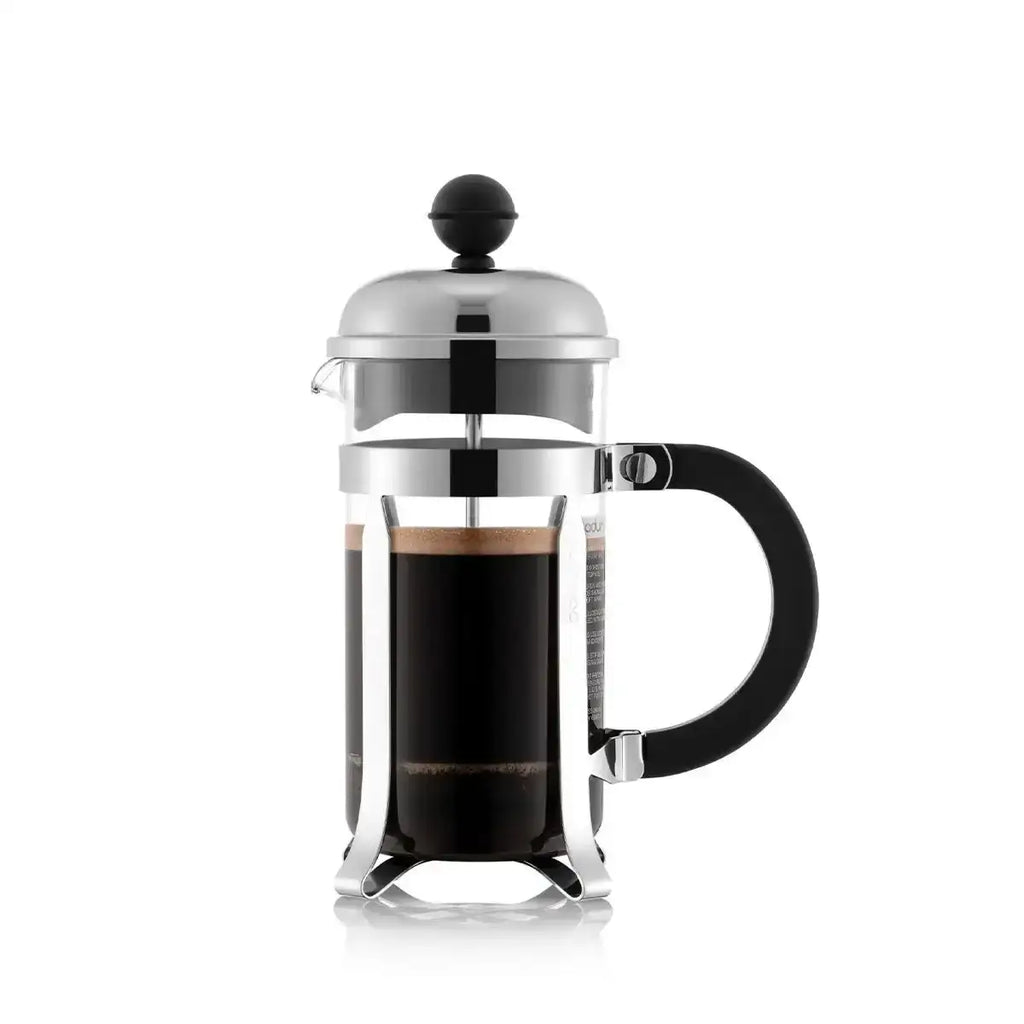 French press coffee maker with black interior on a white background