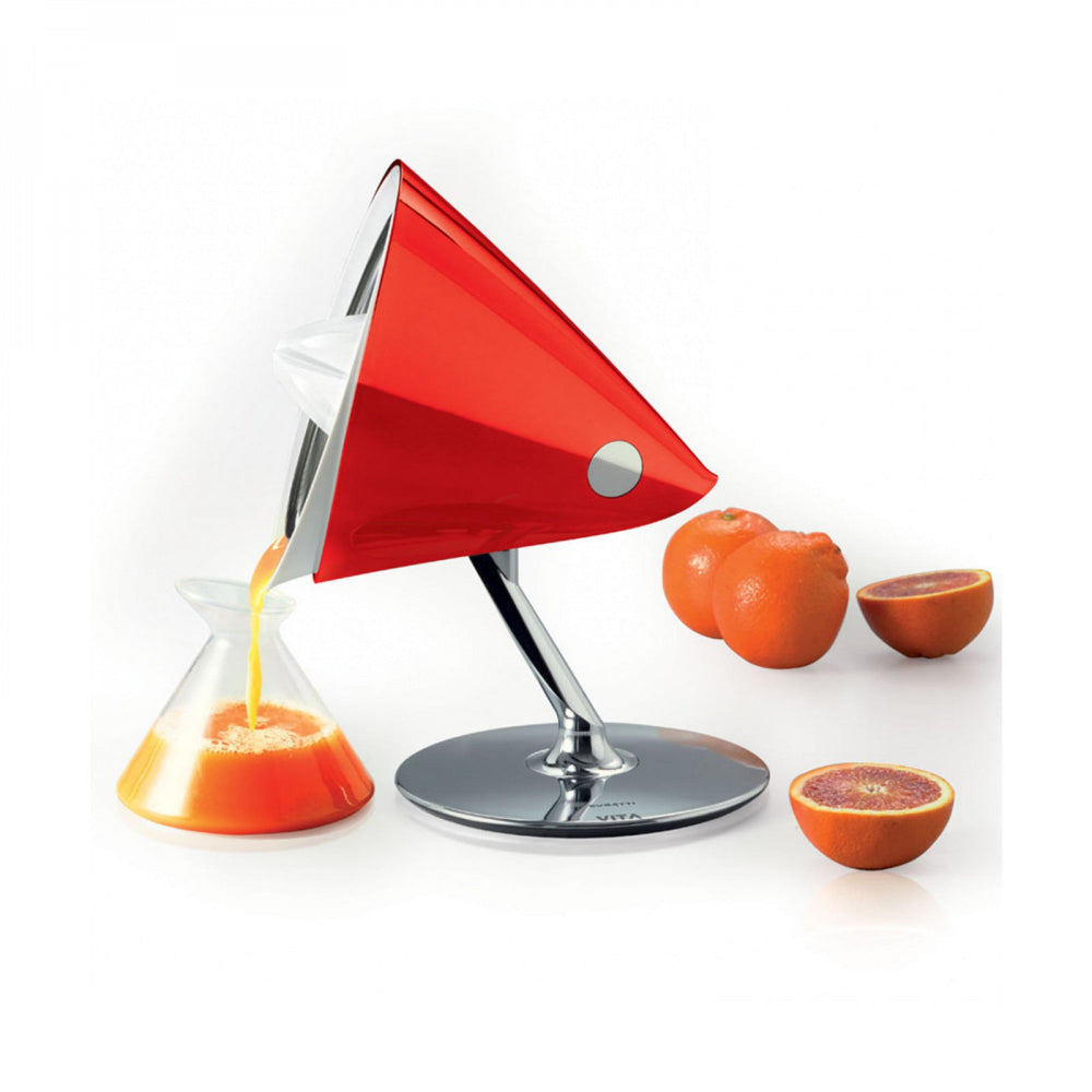 Red citrus juicer with a white background 