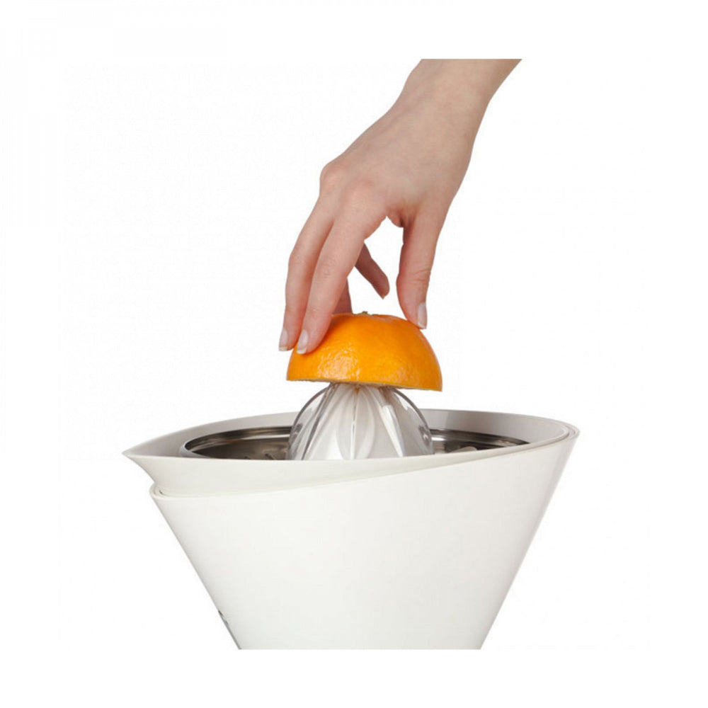Person using a white citrus juicer with a white background