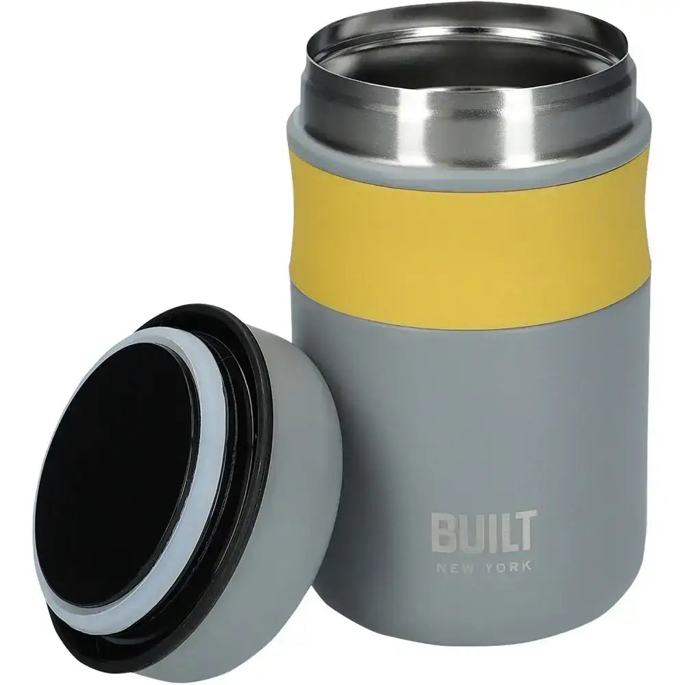 Gray and yellow insulated mug with 'BUILT New York' branding on a white background