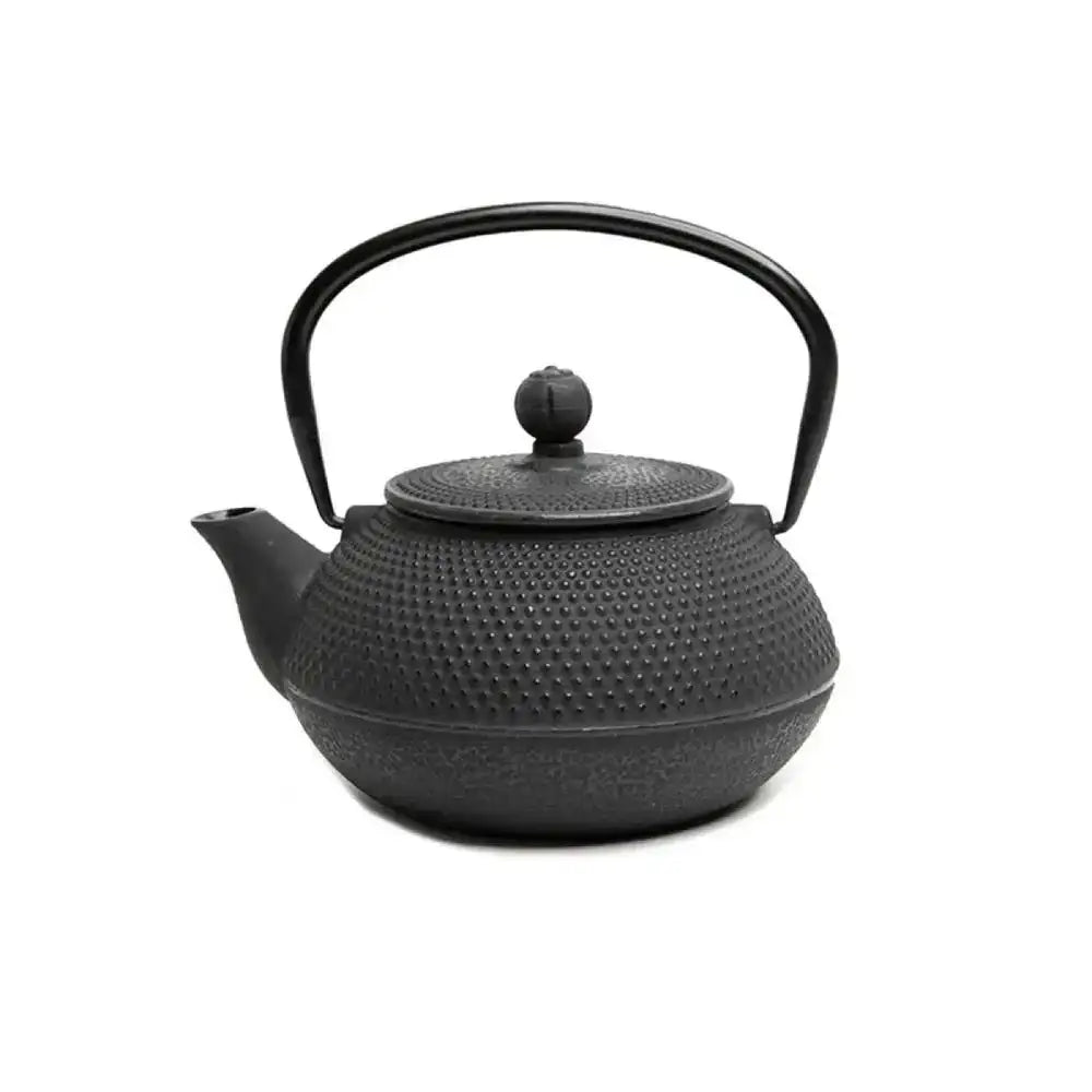 Black textured teapot on a white background