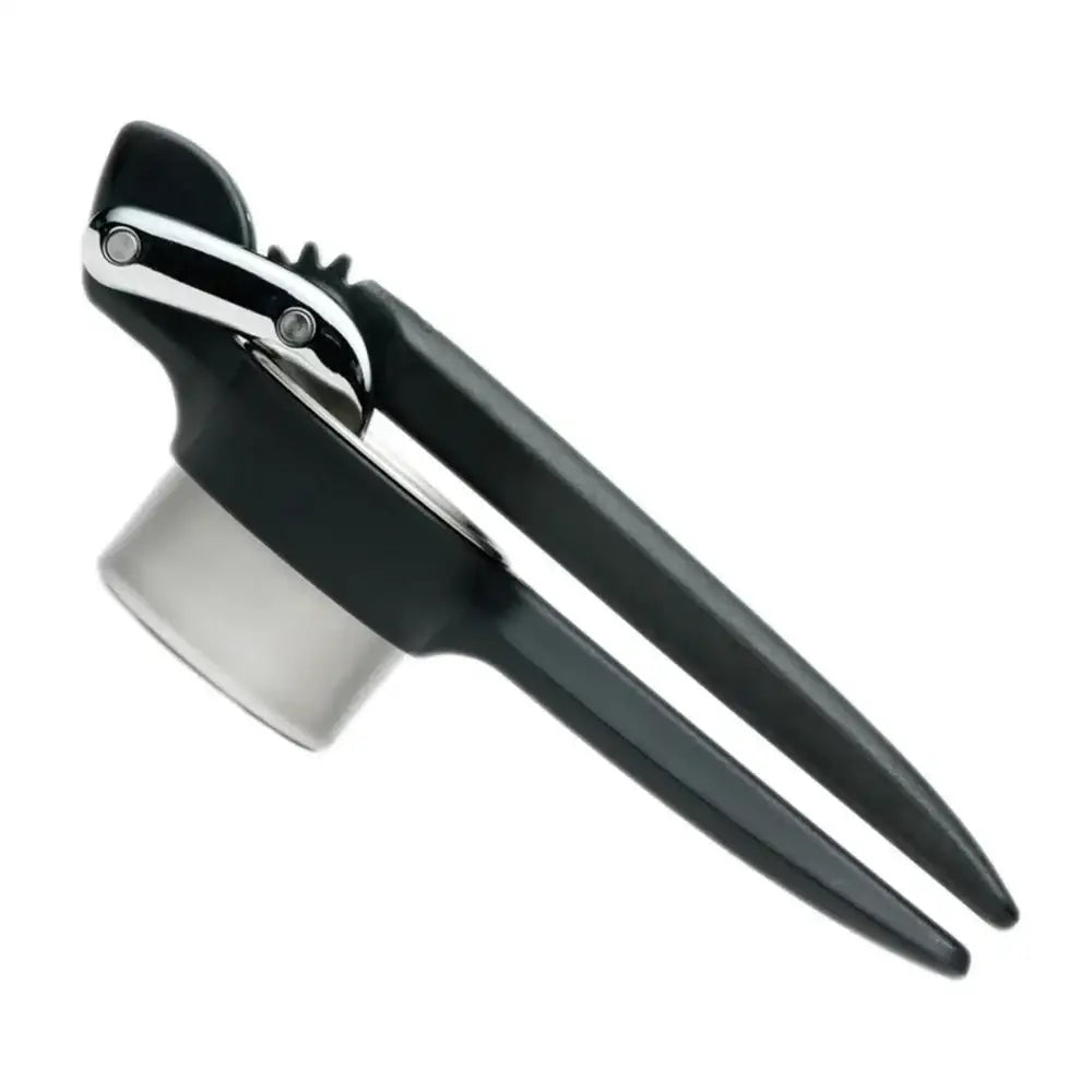 Black and silver potato press on a white background