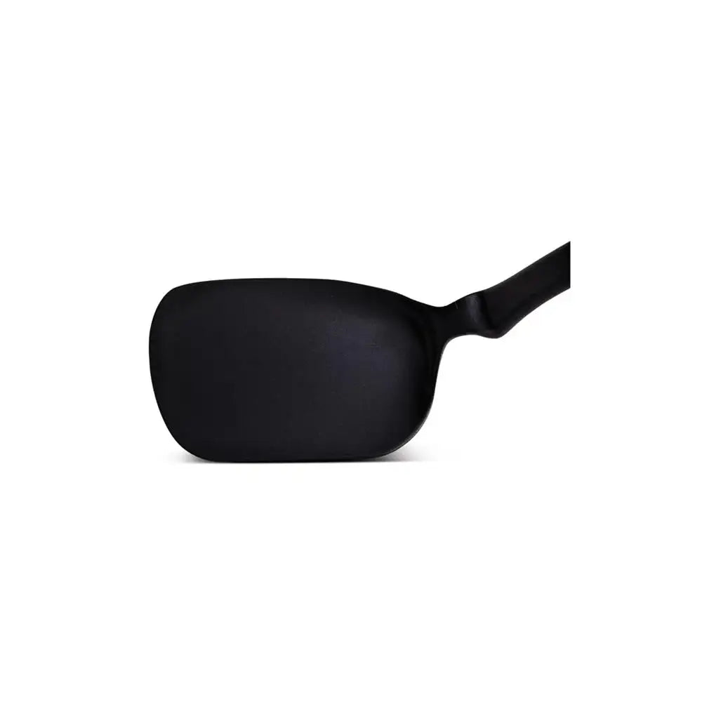 Black spoon on a white background