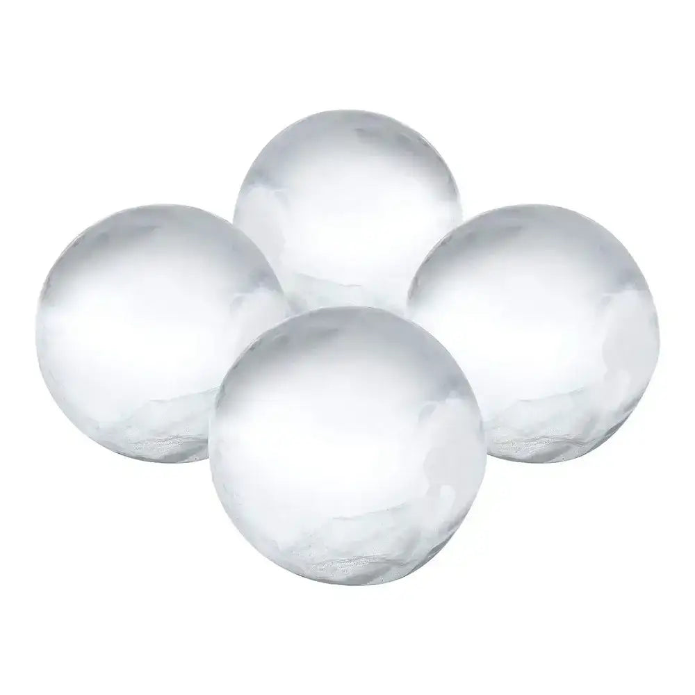 Four clear round ice balls made with Cilio ice ball mould, kitchenware from Cookin Stores