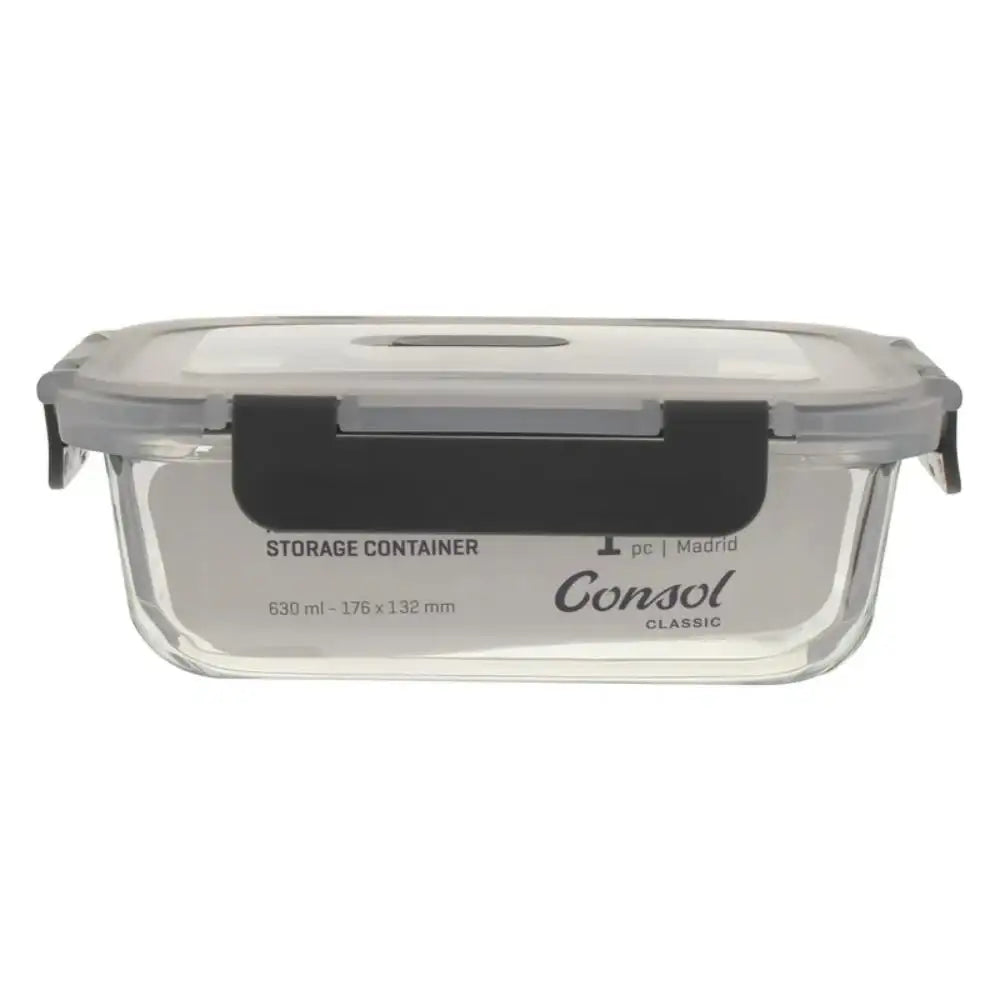 Glass storage container with a black lid on a white background