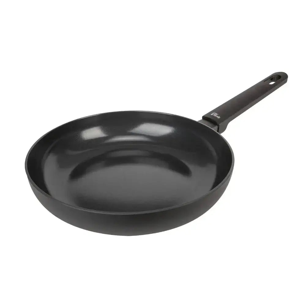 Black frying pan on a white background