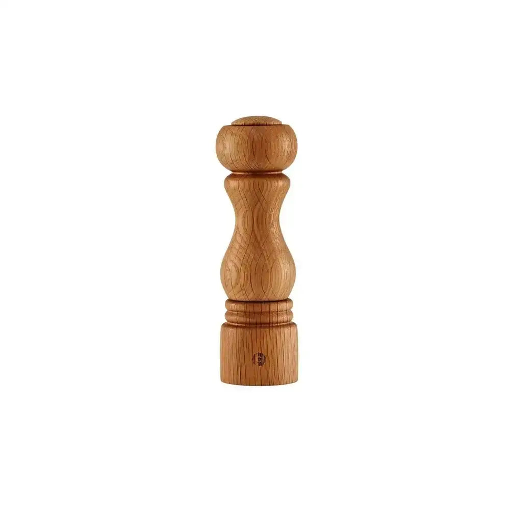 Wooden pepper grinder on a white background