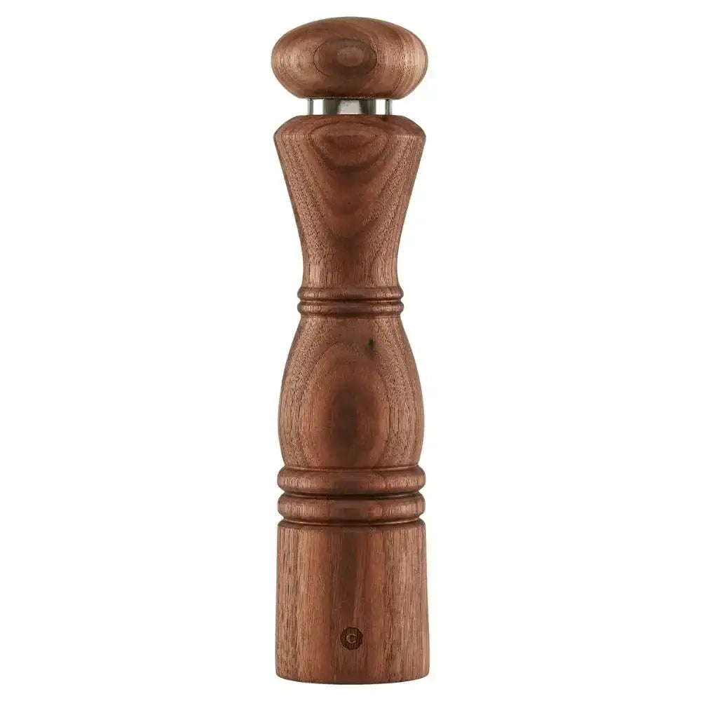 Wooden pepper grinder on a white background