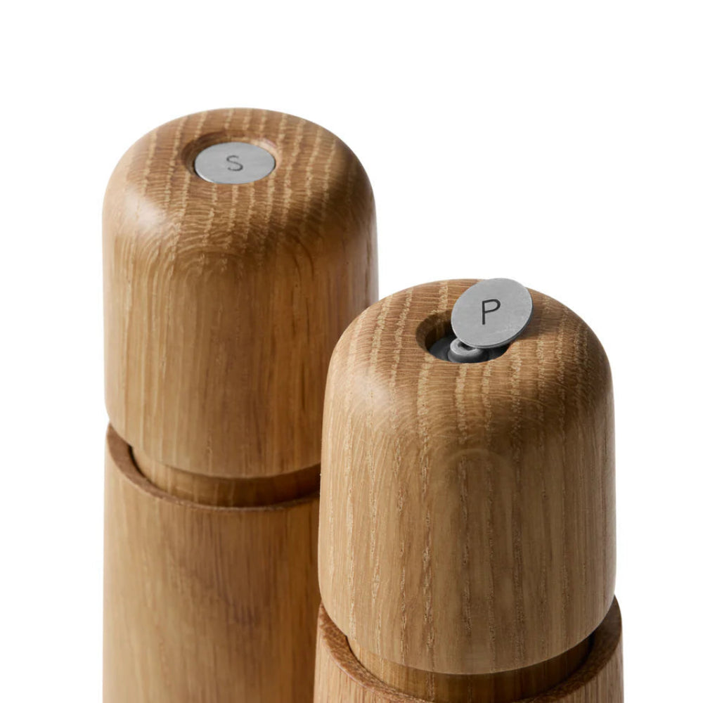 Close up of salt and pepper grinders 