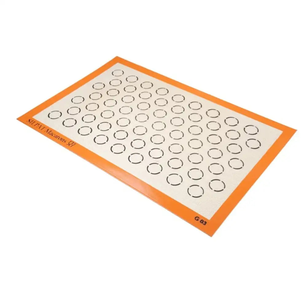 Silicone baking mat with circular shapes on a white background