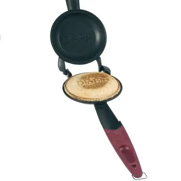 Diablo Titanium non-stick jaffle iron with maroon handle and toasted sandwich, Cookin Stores