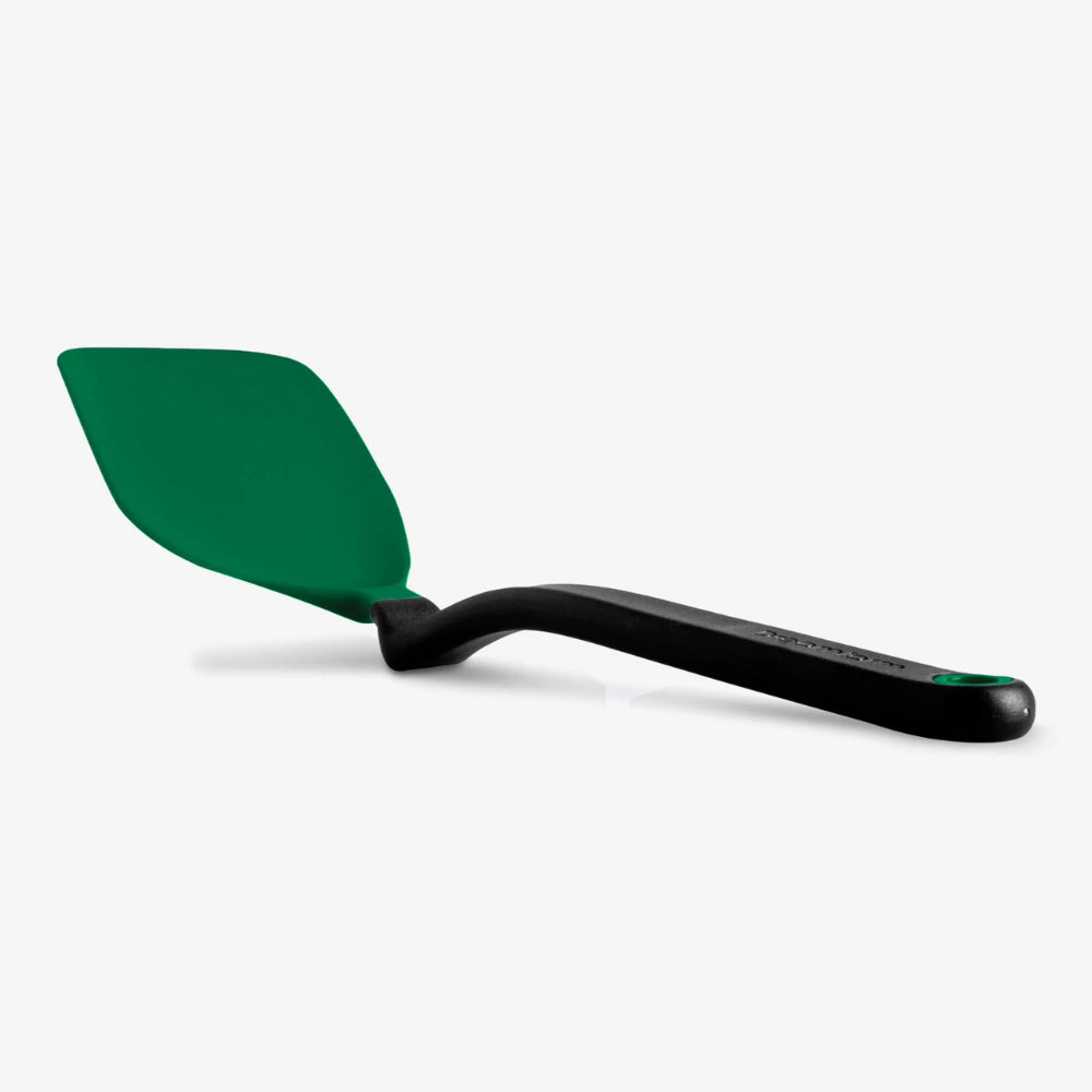 A green spatula with a black handle on a white background