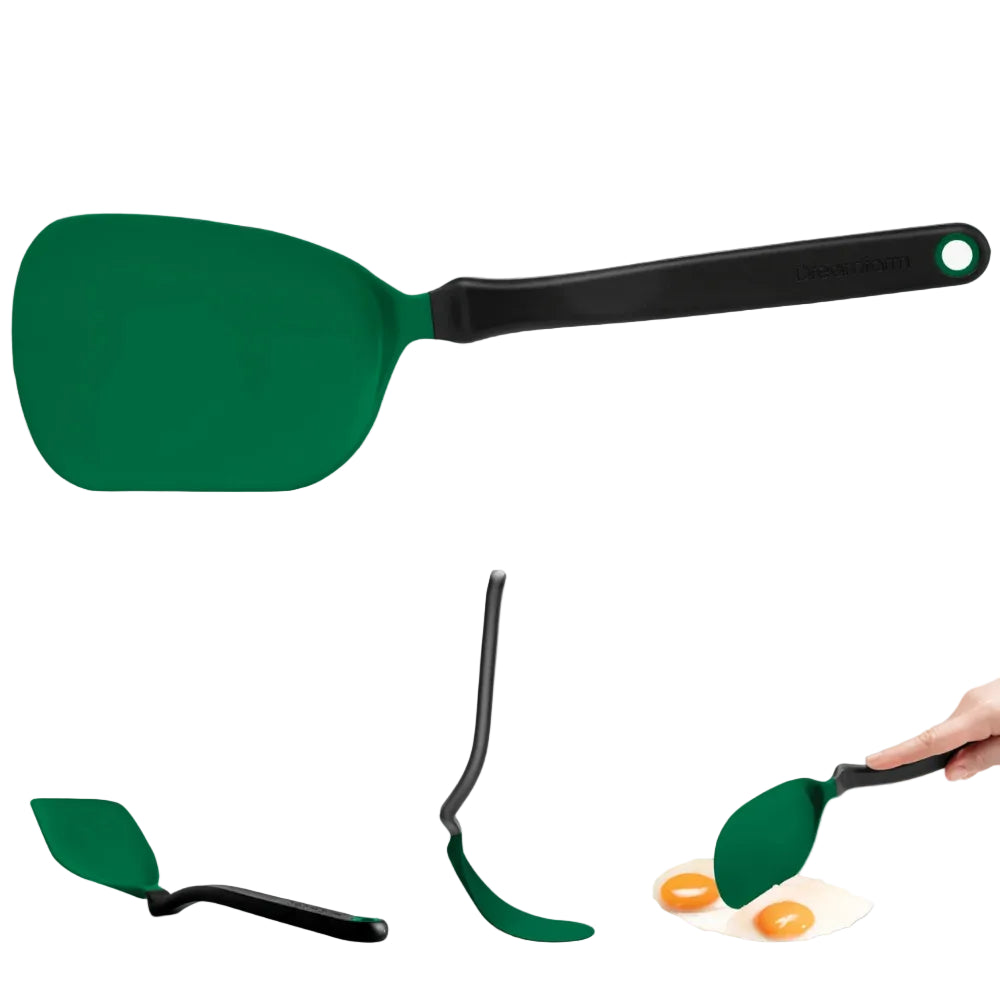 Green spatula with black handle on a white background