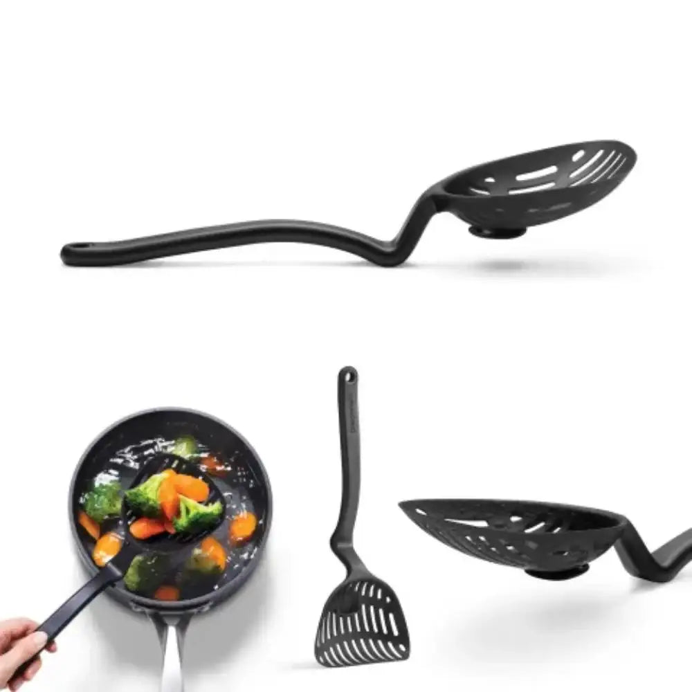 Black kitchen utensils including a spatula, ladle, and frying pan with vegetables on a white background.