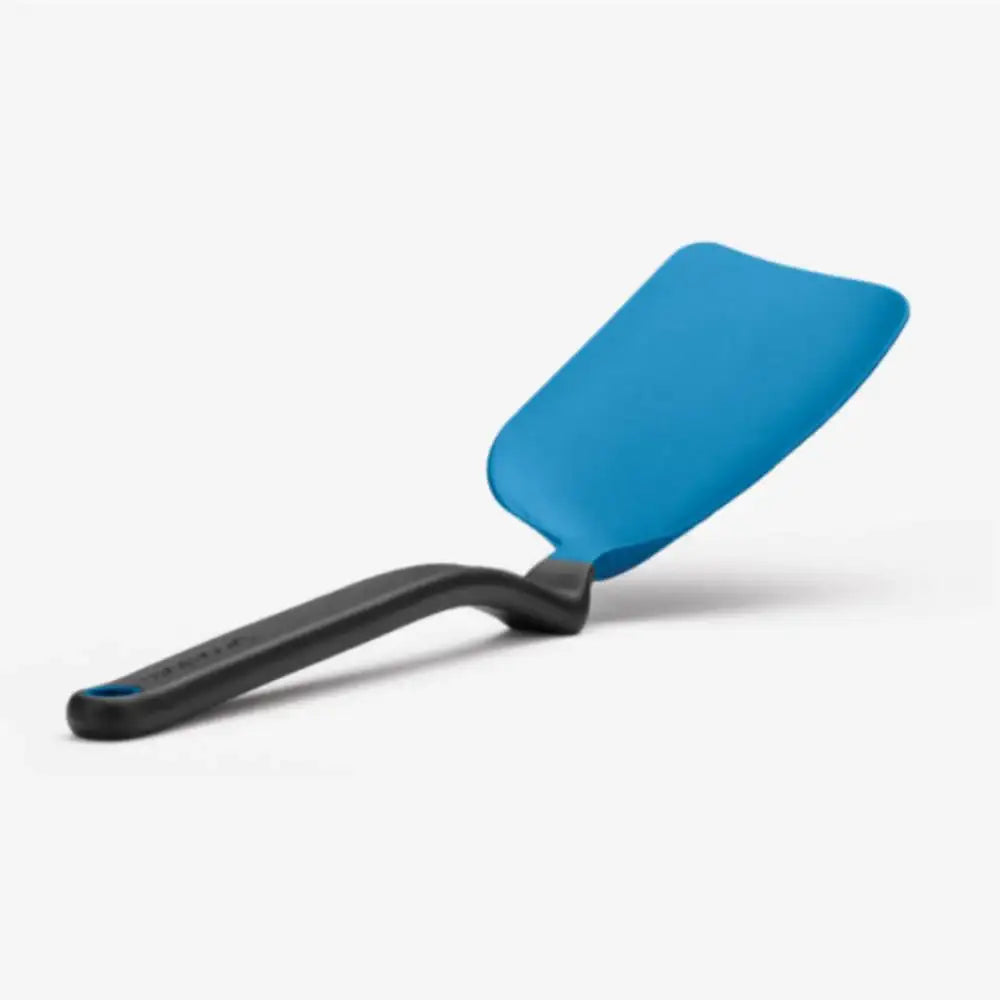 Blue spatula with black handle on a white background