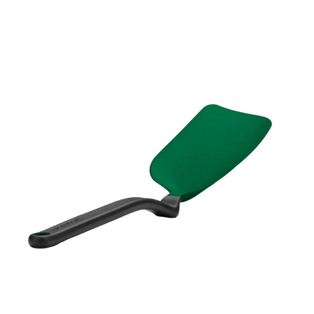 A green spoon with a black handle on a white background.