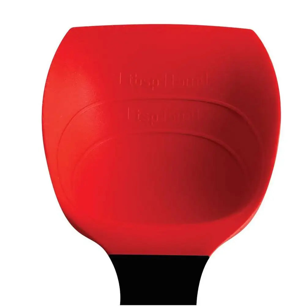 Red silicone spatula with black handle on a white background