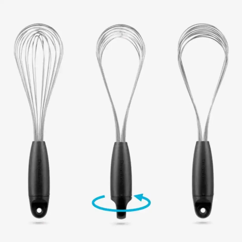 Three whisks with black handles on a white background
