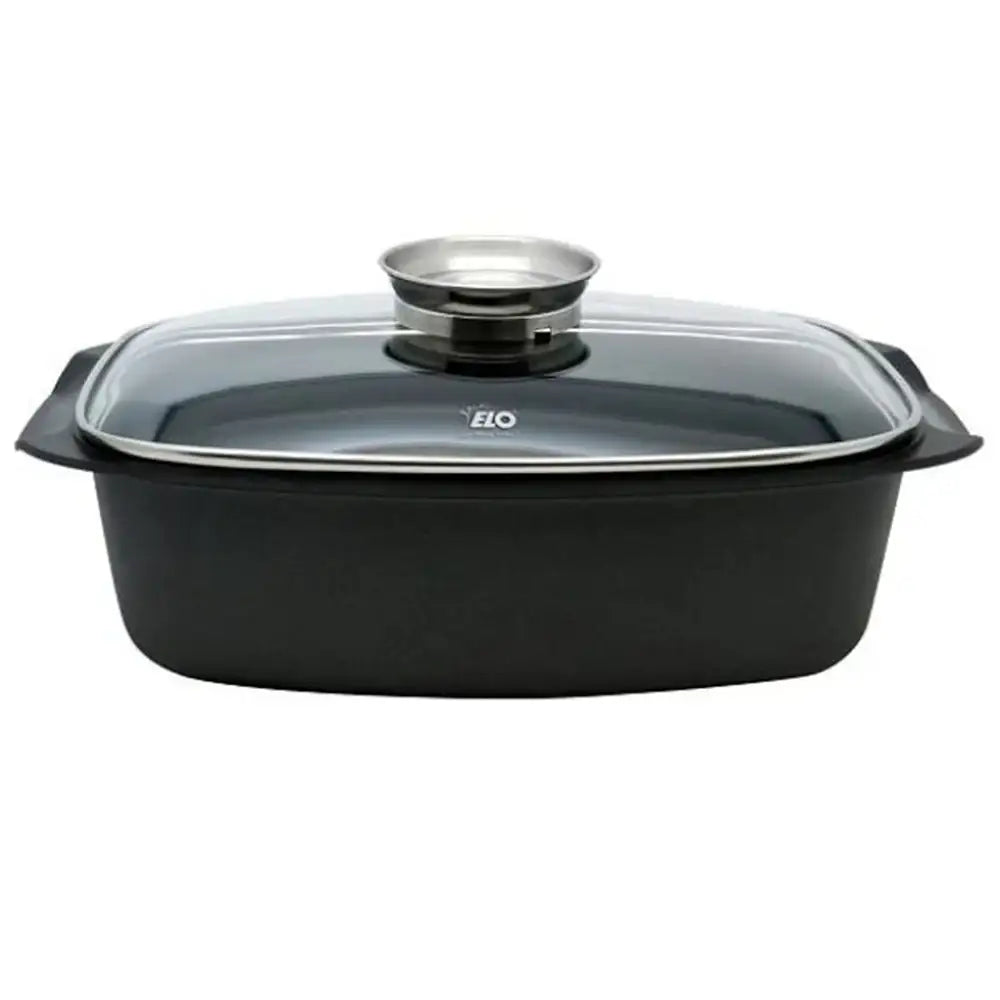 Black rectangular baking dish with glass lid and metal handle on a white background
