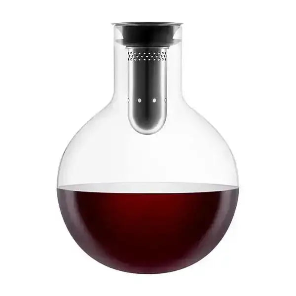 Eva Solo glass wine decanter carafe with stainless steel stopper, filled with red wine