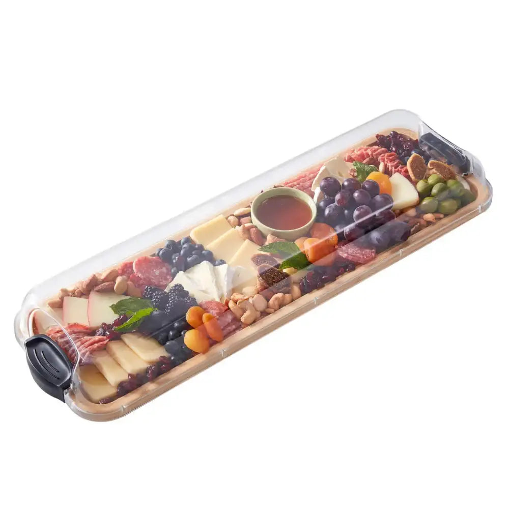 Rectangular charcuterie board with assorted meats, cheeses, fruits, and nuts on a white background.