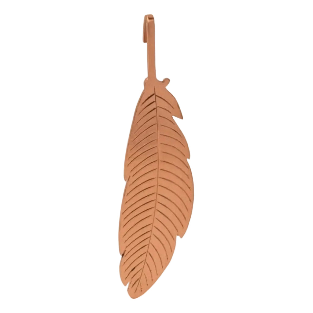 A copper-colored metal feather infuser on a white background