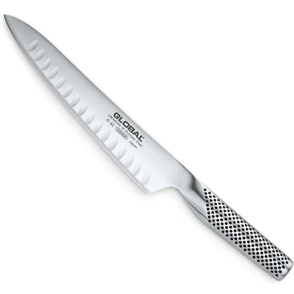 Stainless steel kitchen knife with 'Global' branding on a white background