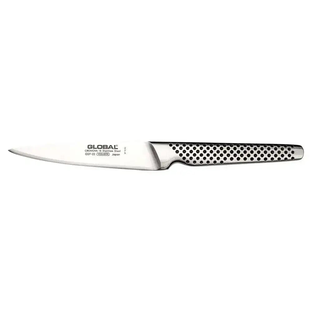 Knife with a textured handle on a white background, featuring the Global brand.