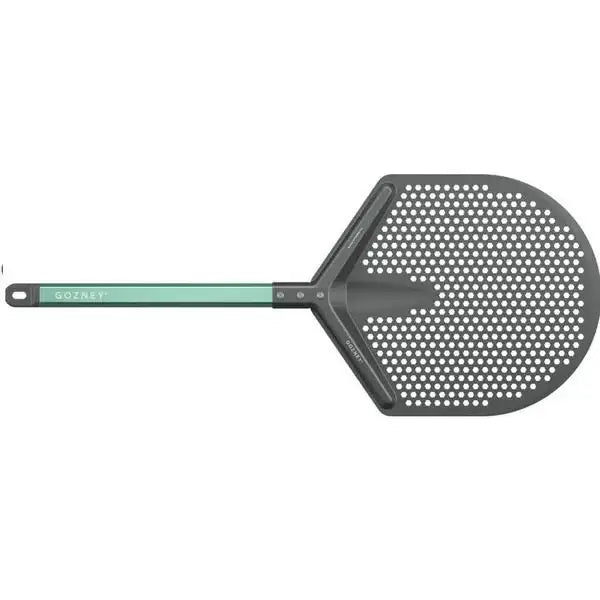 Gozney Pro placement pizza peel with perforated metal head and green handle, premium kitchenware
