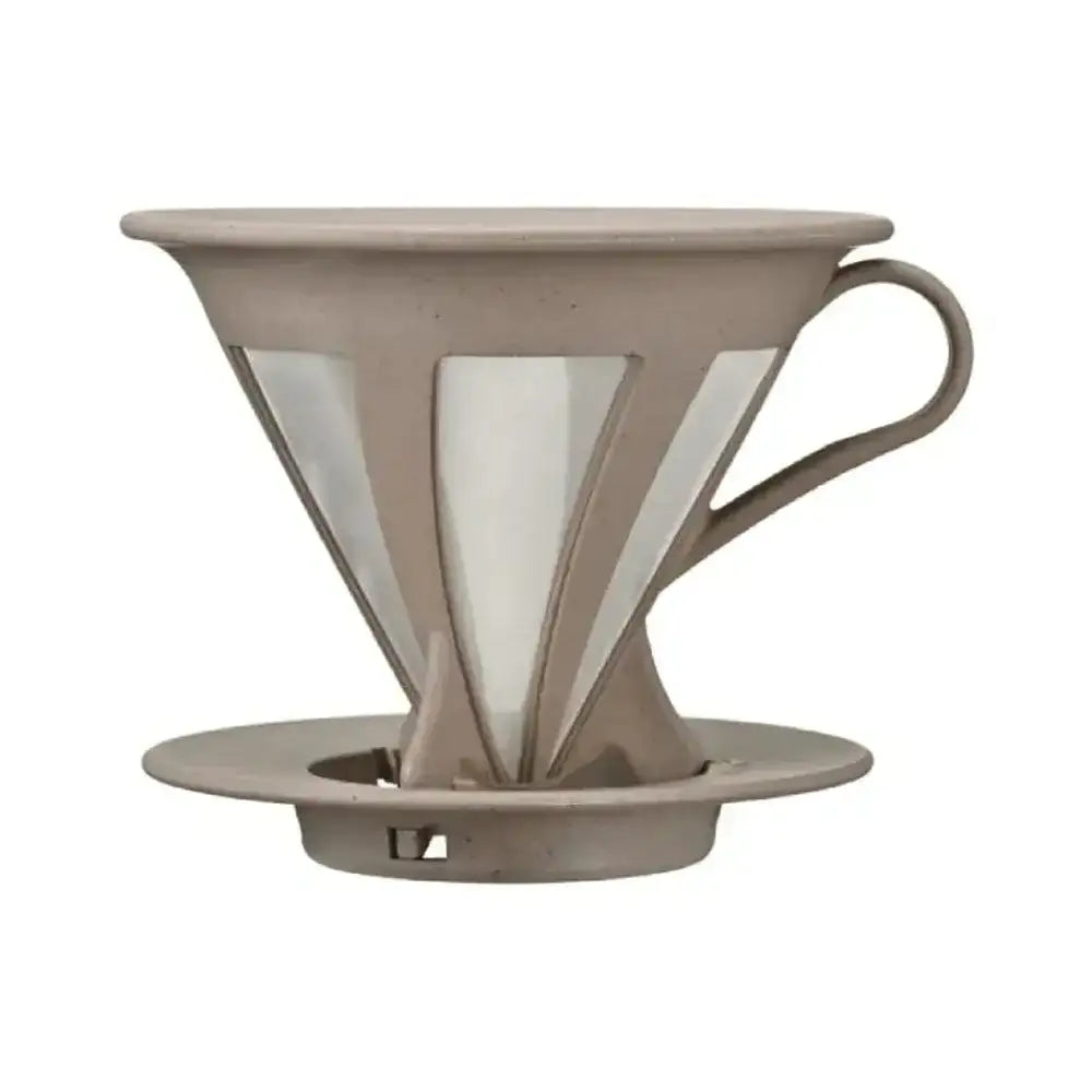 Beige ceramic coffee dripper on a white background