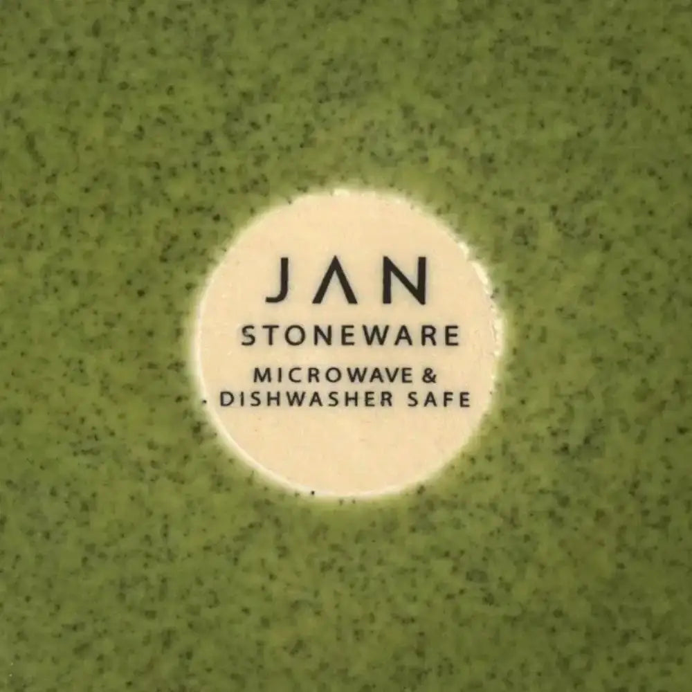 Stoneware label on a green speckled background