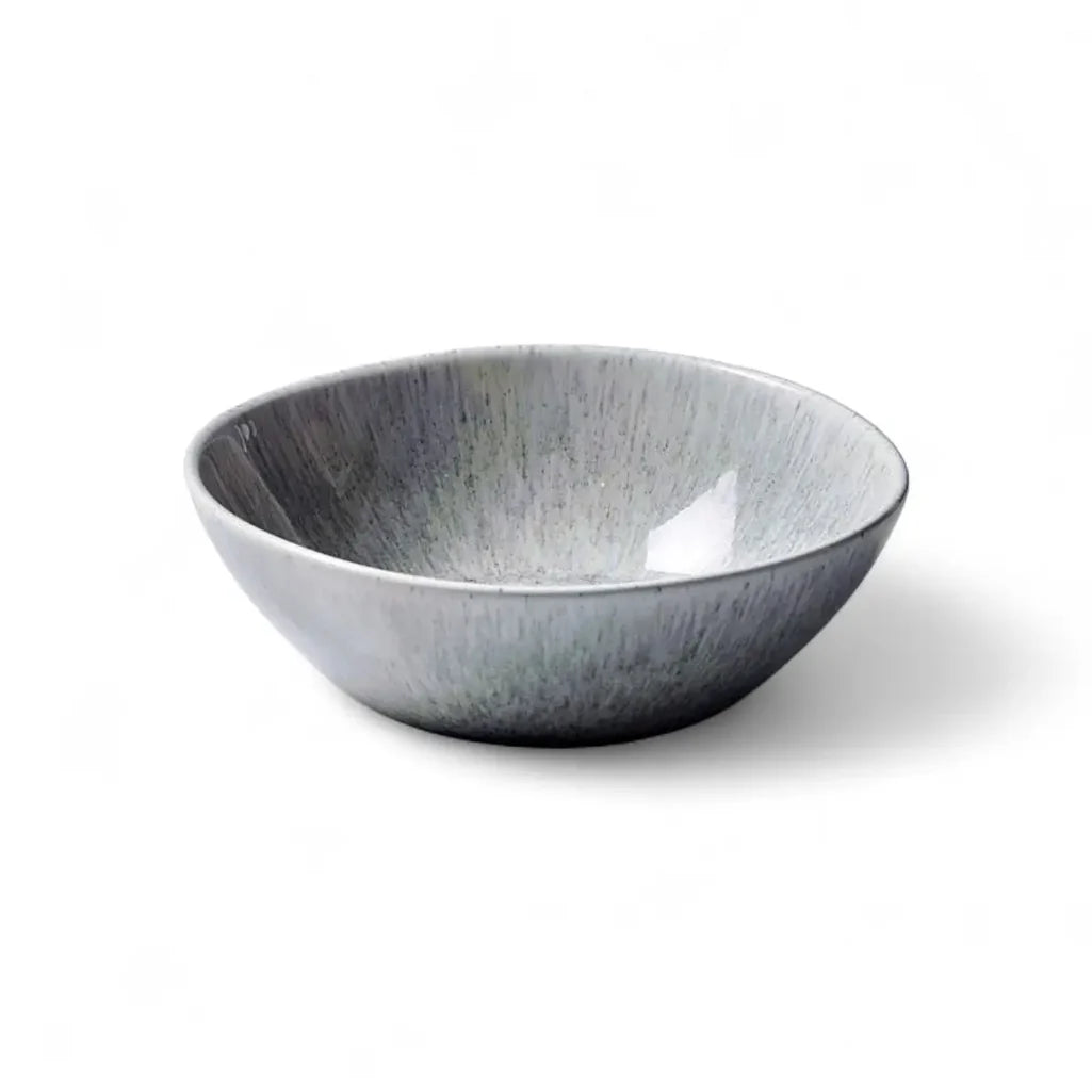 Gray ceramic bowl on a white background